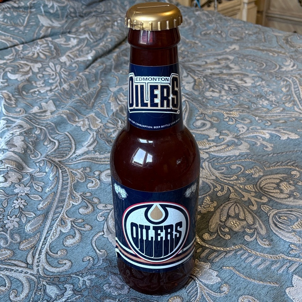 NHL Edmonton Oilers Brown Bottle with Gold Cap Coin Bank